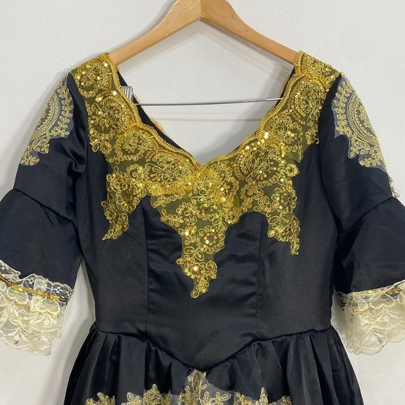 Elegant Black and Gold Women's Dress - Picture 2 of 10